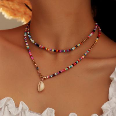 China New Arrival Bohemia Women's Wholesale Bohemia Necklace White Shell Pendant Colorful Bead Chain Necklace for sale