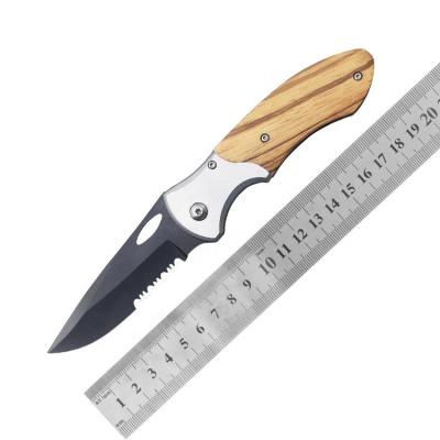 China Camping Non-variable Popular Wooden Outdoor Knife Handle Steel Half Saw Blade Survival Folding Knife for sale