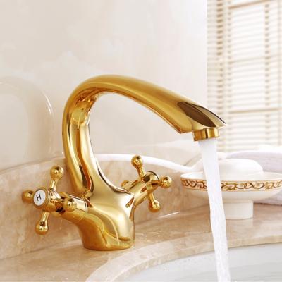 China Traditional Double Handle Single Hole Faucet Brass Gold Bathroom Basin Faucet for sale