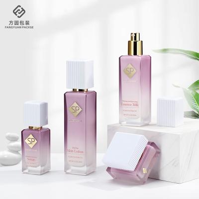 China Custom Logo Gradient Skin Care Glass Bottles Jars Manufacturer Wholesale Cosmetic Lotion Thick Square Glass Bottle for sale