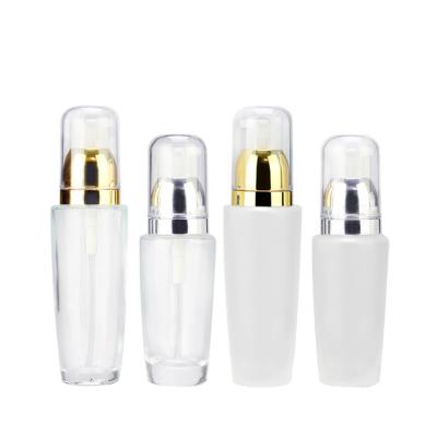 China In Stock Factory Customized Luxury Transparent Cylindrical Glass Liquid Base Essence Bottle for sale