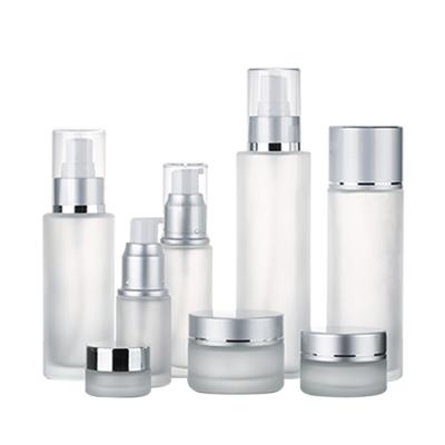 China Wholesale Full Set Cosmetic Skin Care Packaging Frosted Glass Lotion Pump Bottle With Matte Silver Cap 5g 10g 20g Glass Jar for sale