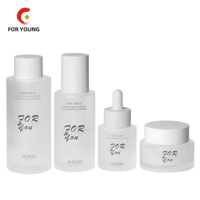 China Wholesale Clear Frosted Set Cosmetic Factory Cylinder Skin Care Glass Packaging Dropper Serum Essential Oil Lotion Pump Sprayer Bottle for sale