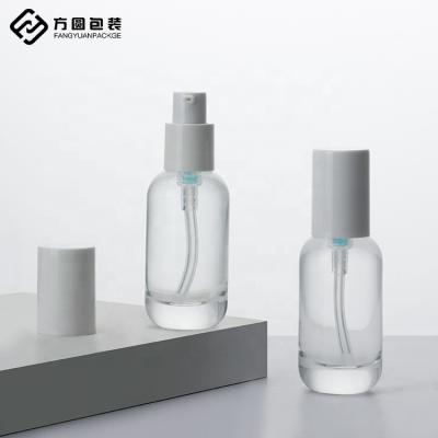 China Clear 30ML Glass Lotion Cosmetic Thick Bottom Base Bottle Skin Care Liquid Serum Packaging Bottles for sale