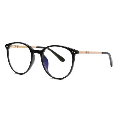 China 10 Years Experience Twooo 2055 Newest Clear Glass Round Frame Blue Light Blocking Glasses for sale