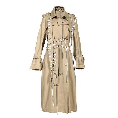 China Women's Trenc Long Trenc Coat Drawstring Anti-Shrink Bandage Coated Patchwork Irregular Khaki Long Overcoat for sale