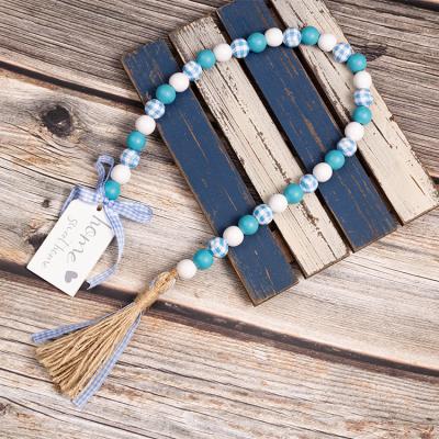 China Classic minimalist DIANJIN style Nordic spring wood beads wooden bead tassels garland for sale