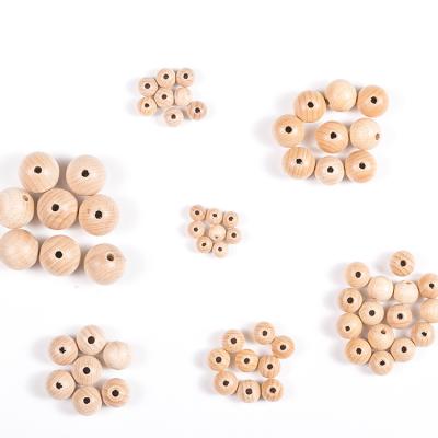 China Decorative Round Wooden Beads From Legno Perline Lampadario Di In Legno Wood From Wooden Set DIANJIN Cuentas De Madera Al Por Mayor Bulk Craft for sale