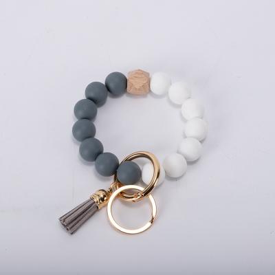 China 2021 Custom Wooden Silicone DIANJIN Silicone Bead Bracelet Beaded Key Chain Bracelet 2021 for sale