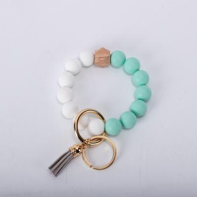 China 2021 Silicone DIANJIN Llavero De Pulsera Custom Silicone Beaded Keychains Silicone Bead Wristband Key Chain Keyring for sale