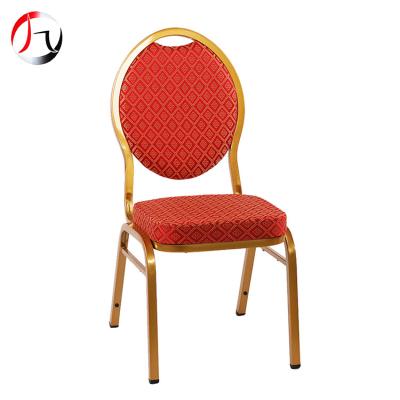 China Modern Stacking Back Red Oval Fabric Iron Frame Banquet Hall Chairs For Hotel Wedding for sale