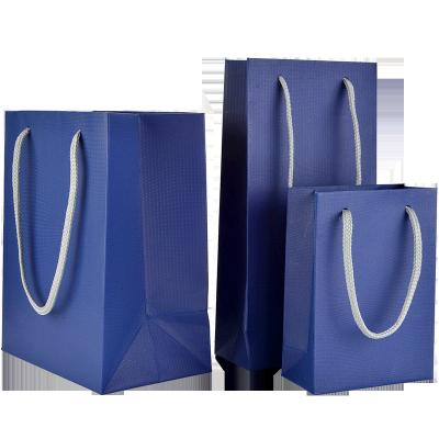 China Recycled Materials Ready To Ship Embossing Paper Bags Recycled Gift Bags With Handles Instock Printed Your LOGO for sale