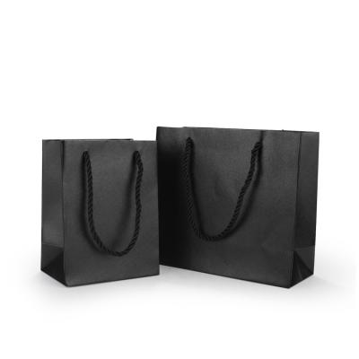 China Reused Materials Matte Black Paper Packaging Bag Foldable Handmade for Retailer for sale