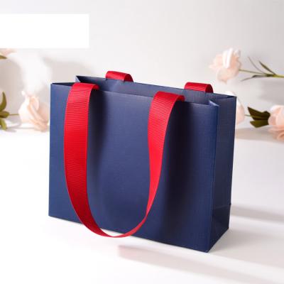 China Recyclable Paper Tote Art Paper Bags With Rinbow Handles Custom Shopping Tote Bags Free Design for sale