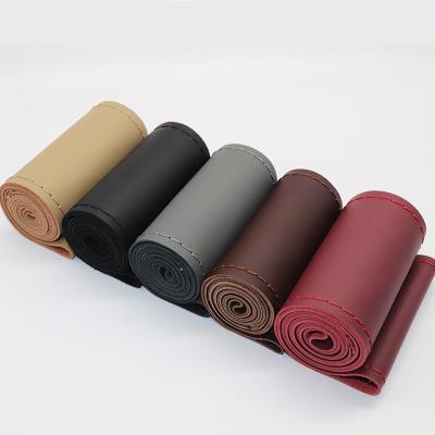 China Plain Color No Pattern Interior Auto Parts Supplies Hand Stitched Leather Steering Cover Anti-Slip Breathable Universal Handlebar Leather Cover for sale