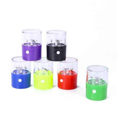 China Custom Logo Smoking Tobacco Plastic Herb Grinder Machine Wholesale Electric Herb Grinder Windproof Machine for sale