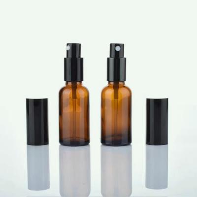 China 10ml30ml50ml Spray Bottles Glass Cosmetic Hot Selling Dark Brown Spray Bottle With Black Cap for sale