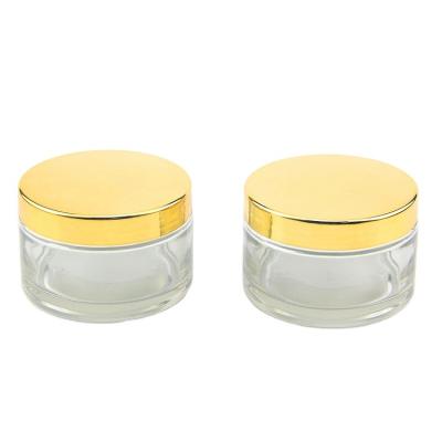 China Skin Care Cream Large Capacity 200g Clear Glass Cream Jar 200ml Cosmetic Cream Jar With Gold Lid for sale