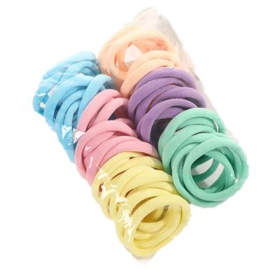 China 50pcs/bag 4cm Popular Seamless Elastic Band Headband Hair Band,Korea High Elastic Color Candy Color Headband for sale