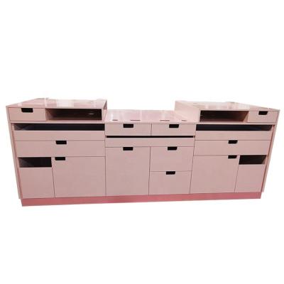 China Pretty new high quality retail store wholesale custom design counter boutique pink furniture for shop and stores for clothing store for sale