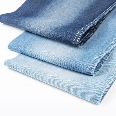 China Breathable Smooth 67%Cotton 21%Polyester 10%Viscose 2% Spandex Denim Twill Weave Lightweight 5.3oz Stretch Denim Fabric Faux Denim Fabric for sale