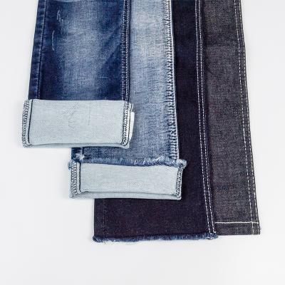 China Wholesale Breathable 98% Cotton 2 Spandex 9.4oz Light 4 Way Denim Selvedge Fake Knit Denim Fabric Jeans Pants Fabric for sale