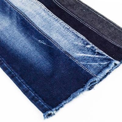 China Breathable Wholesale 98% Cotton 2 Spandex 9.4oz TR Light 4 Way Denim Fabric Selvedge Fake Knit Stretch Jeans Fabric for sale