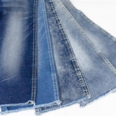 China Breathable Light Denim Fabric Twill Jeans Material 65% Cotton 33% Polyester 2% Spandex 8.3oz OE Selvage Knit Denim Fabric For Shirt for sale