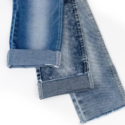 China Breathable 65% Cotton 33% Polyester 2% Spandex 8.3oz OE Light Denim Fabric Wholesale Twill Jeans Material Japanese Selvedge Denim Fabric for sale