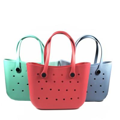 China Fashion Durable Hollow Eyed Handbag Hole Beach Bag EVA Large Tote Bag for sale