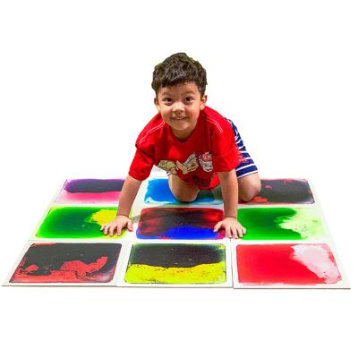 China Custom Wholesale 100%PVC Indoor Ceramic Sensory Moving Liquid Floor Tiles For School for sale