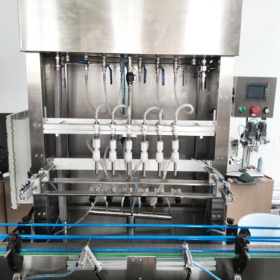 China Touch Screen Operate Auto Bottle Filling Machine With Stainless Steel Frame for sale