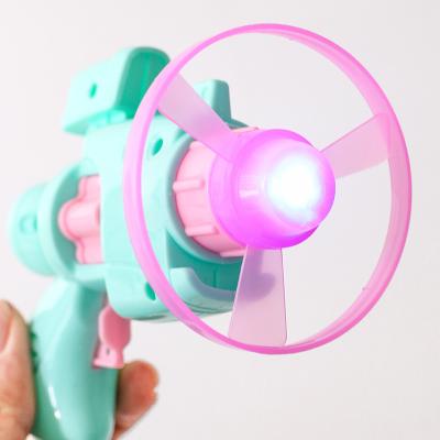 China Flying Saucer Gun Safe With Light Other Toys Flying Disc Shooting Top Bamboo Kids Outdoor Sky Dragonfly Toy Guns for sale