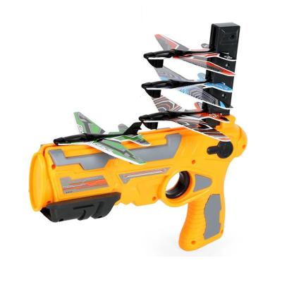 China Safety Foam Airplane Throwing Gun Kids Ejection Gun Glider Airplane Launcher Outdoor Toy with Plastic Gun Toys for Kids for sale