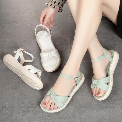 China Fashion Trend Hot Stylish Female Slides Shoes Leather Slipper Women Heeled Sandals Latest Design Leather Strap Jelly Sandals for sale