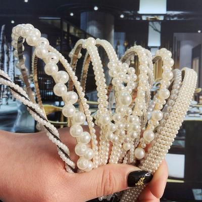 China Fashion Jewelry Accessories Big Pearl Headband Bow Flower Hair Circle Pearl Handmade Hairbands For Women for sale