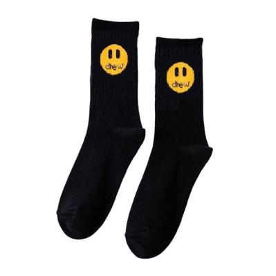 China Sporty men smiling to face European mid-tube street fashion skateboard sports socks cotton solid socks for sale