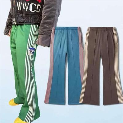 China Polyester/Cotton Y2K Men Women Casual Joggers with Flared Wide Leg and Side Stripes for sale