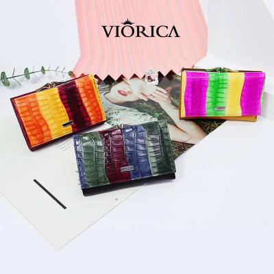 China 2022 Custom Waterproof Lady Short Women Wallets Mini Money Purses Small Fold Serpentine Genuine Leather Female Coin Card Holder for sale