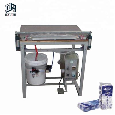 China Other Semi Automatic Toilet Paper Roll Wrapping Packing Machine Bag Sealer With Trimmer for sale