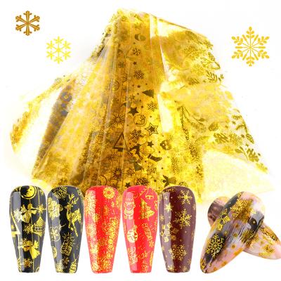 China New Arrival 10pcs/pack Christmas Snowflake Nail Art Decoration Starry Sky Paper Gold Foil Manicure Transfer Foil Nails for sale