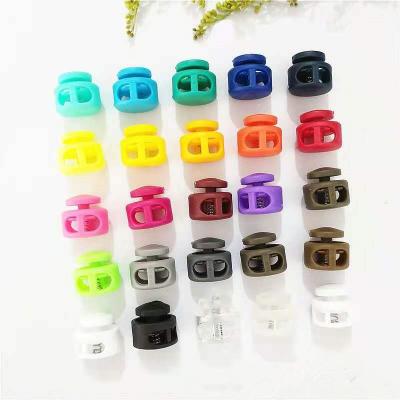 China Daily Available Off-the-Shelf Plastic Pig Nose Buckle Double-hole Spring Buckle Spring Buckle Color Environmental Friendly Windpr for sale