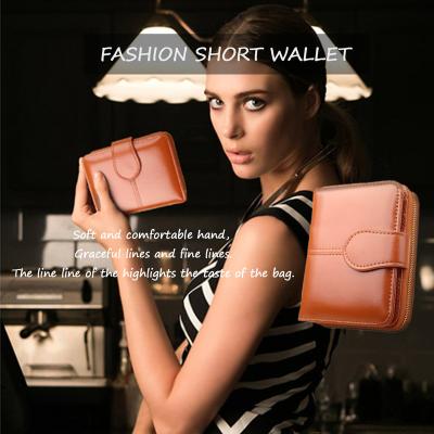 China Fashion Young Women's Purses Waterproof Zipper Opening Soft Pink And Comfortable Genuine Leather Ladies Wallet With Button for sale