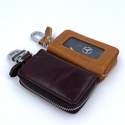 China Fashion Unique Vintage Design Dual Key Pocket Zipper Key Case Genuine Leather Car Key Wallet for sale