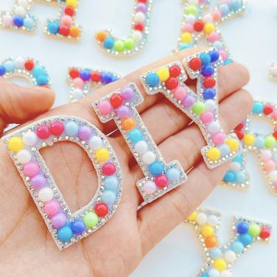 China Sustainable Cute Clothing Accessories Custom Beaded Alphabet Patches Rhinestones Clothing Patch Iron On for sale