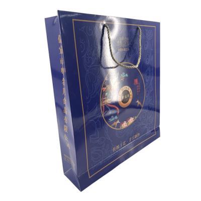 China Custom Biodegradable Shiny Mooncake Packaging Bag With Handle Mid-Autumn Festival Gift Paper Bag Packaging Manufacturer Supplier for sale