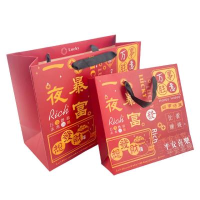 China Newest Gift Biodegradable Luxury Custom Art Paper Packaging Bag With Ribbon Blessing Handle For Business Shopping Tote Bag for sale