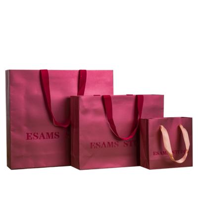 China Highly Used Recyclable Rose Red Packing Large Floral Premium Paper Bags for sale