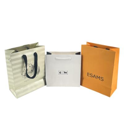 China Biodegradable Custom Design Great Price Luxury Gift Special Paper Packaging Bag With Handle Business Shopping Kraft Paper Bag for sale