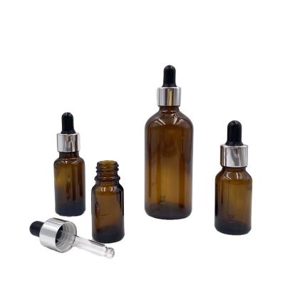 China Silver Bottle 5ml 10ml 15ml 20ml 30ml 50ml 100ml Personal Care Glass Bottle Essential Oil Amber Hair Dropper Bottle In Stock for sale